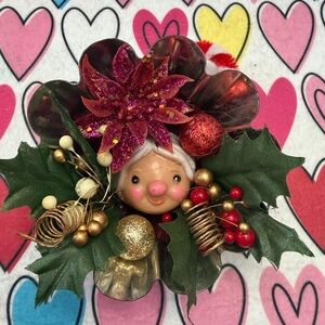 Mrs Claus Celluloid doll face Ornament in vintage tart tin